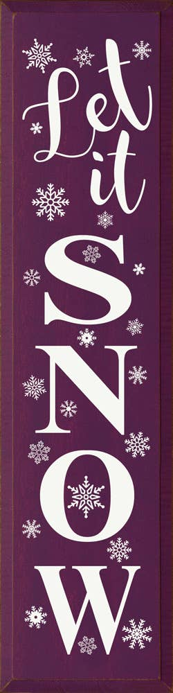 Purple snow-themed wall banner with white 'LET IT SNOW' lettering and snowflakes