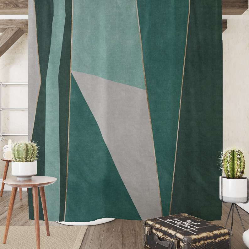 Geometric shower curtain with dark green, teal and gray stripe pattern, draped