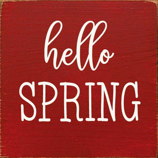 Red square Hello Spring sign with white hello and SPRING script lettering