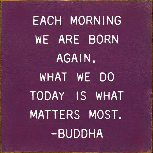 Purple square quote wall art with white text: “Each morning we are born again.” -Buddha