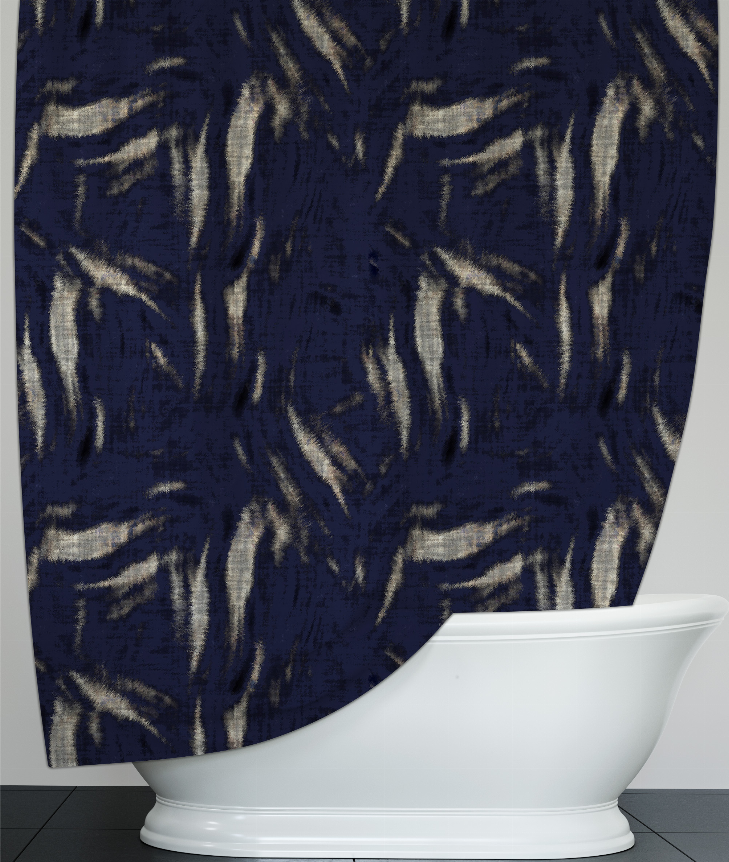 Blue and beige patterned shower curtain fabric close-up with curved lower edge