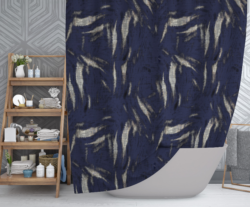 Blue and beige patterned shower curtain with curved drape and top rod grommets