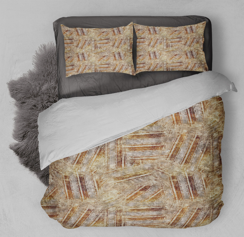 Beige comforter set with gold and rust geometric pattern, two matching pillow shams
