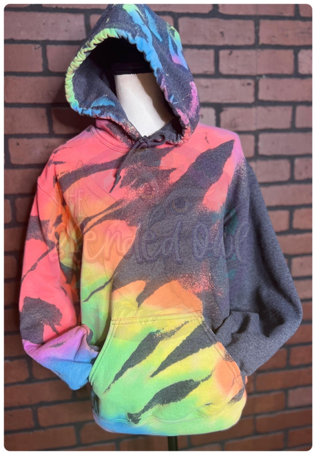 Rainbow burst tie-dye pullover hoodie with hood, long sleeves, and front pocket