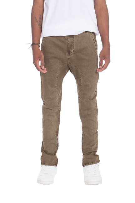 Olive-brown stretch denim drop-crotch pants with stitched pockets and tapered cuffs