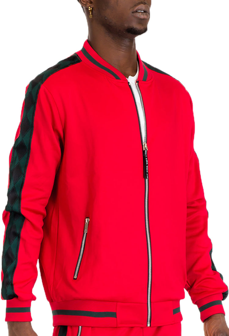 Red track jacket with full zipper, stand collar, and black diamond tape stripes.