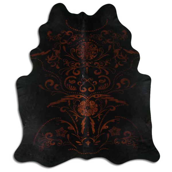 Printed cowhide rug with baroque pattern, brown on dark black base, irregular hide shape