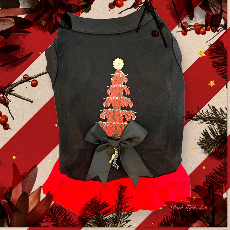 Loubarkin tree dress with tree graphic, large black bow, and red ruffled hem
