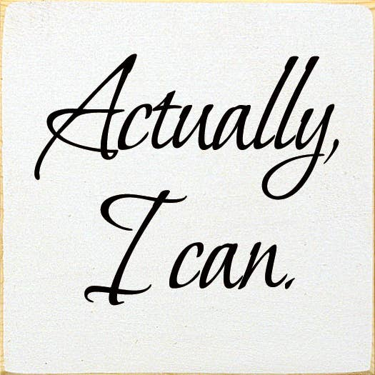 Square wood sign with black cursive 'Actually, I can'.