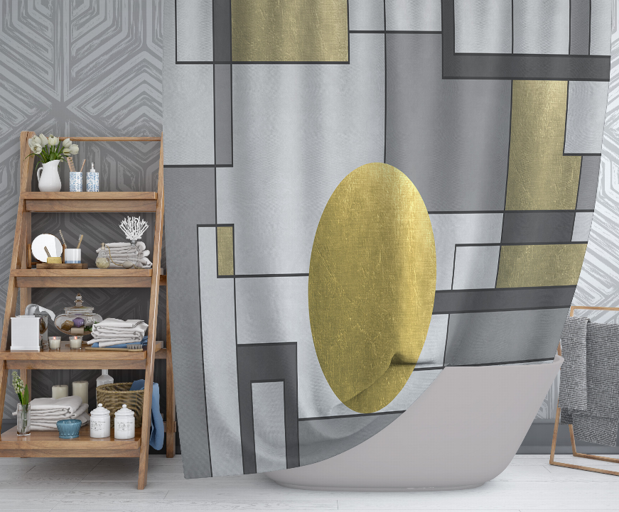 Gray shower curtain with abstract blocks and a large gold oval, curved drape