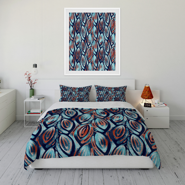 Blue and red patterned duvet cover set with matching pillowcases, flat bed display