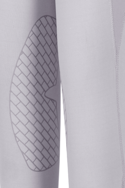 Light gray knee patch on children's equestrian tights with textured grip
