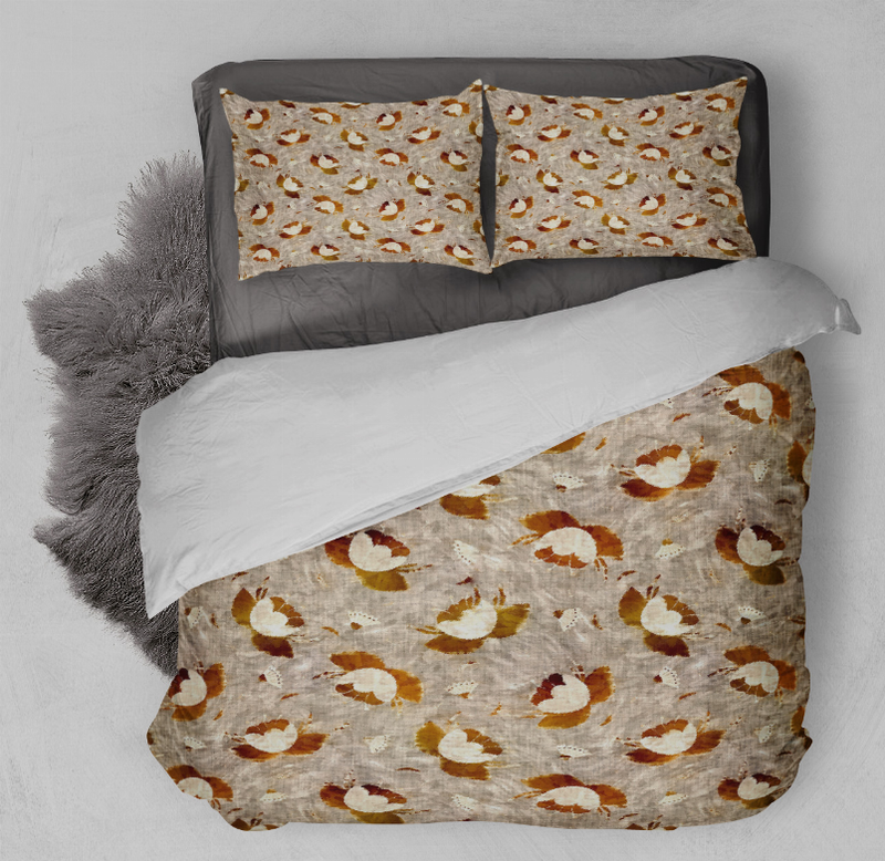 Duvet cover set featuring beige-gray circular print with two matching pillow shams.
