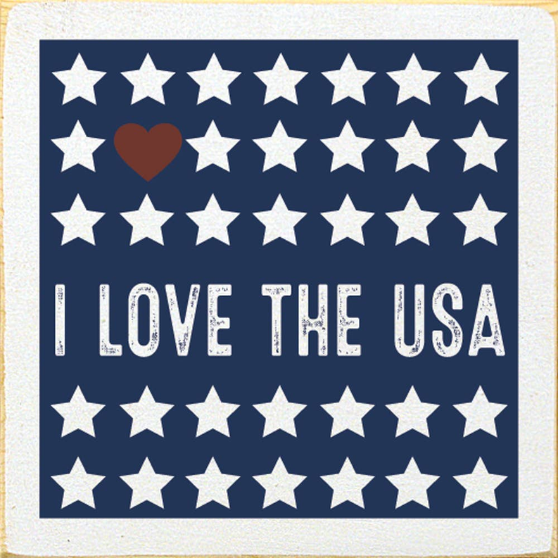 Patriotic square wall sign with white stars, heart, and “I LOVE THE USA” text