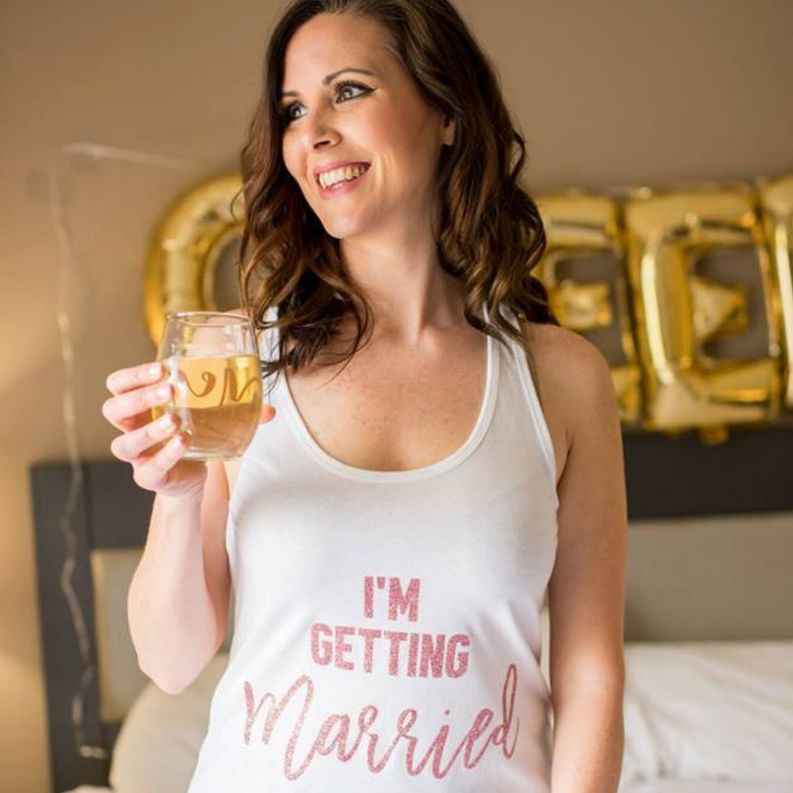 White scoop-neck tank top with red I'm Getting Married script graphic