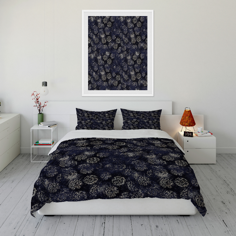 Navy comforter set featuring dark floral pattern with two matching shams