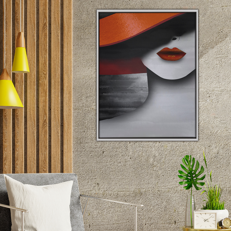 Framed art print with abstract face and red lips, black and orange tones