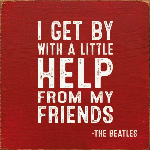 Red square wall art with distressed white quote text, THE BEATLES below.