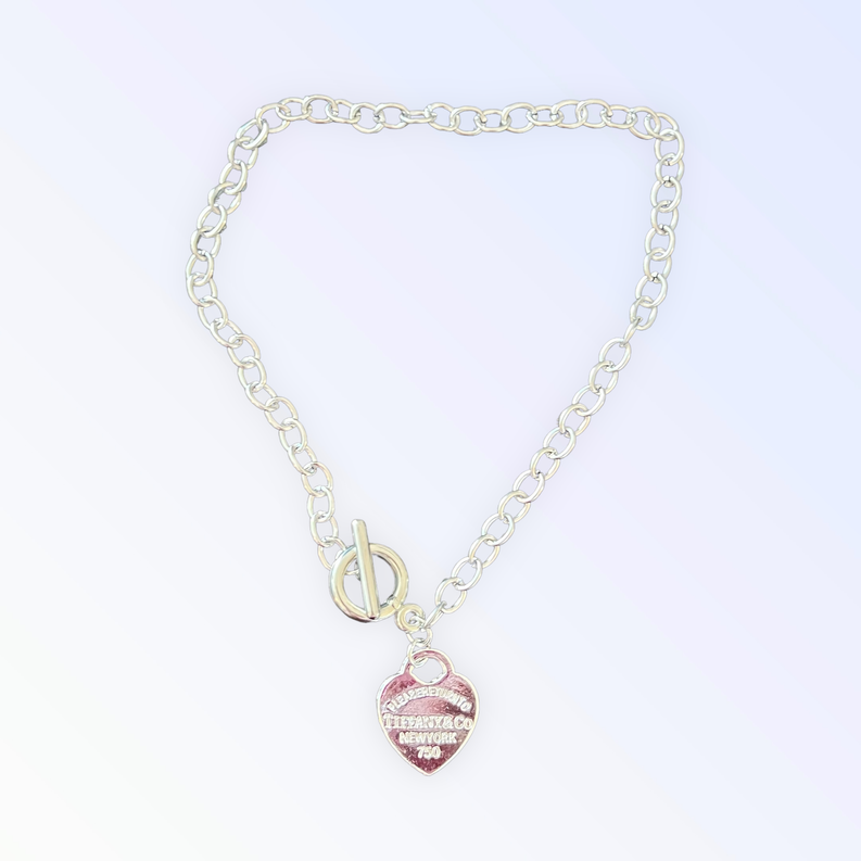 Heart charm necklace with silver chain and pink enamel heart pendant