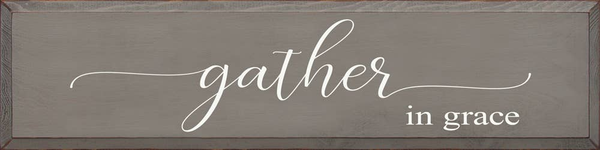 Framed wall sign with gray panel and white script 'gather in grace'