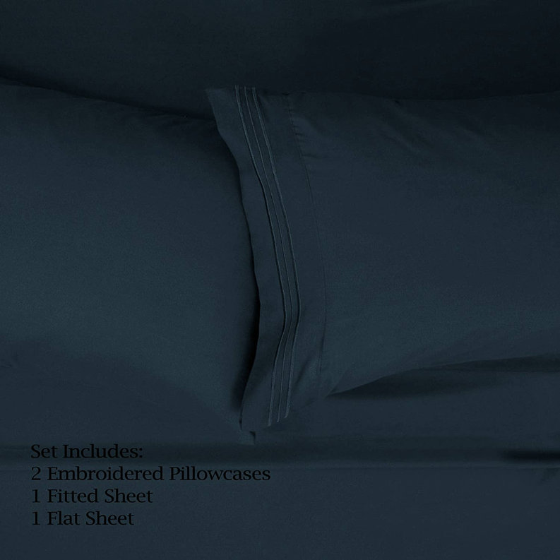 Navy fitted sheet corner with elastic seam stitching
