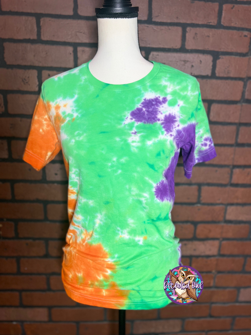 Scrunch tie-dye blank tee with green base, purple and orange swirl accents, crew neck