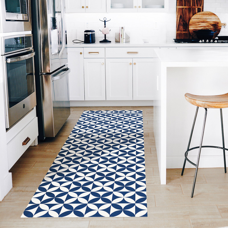 Navy and white geometric non-slip rug runner on kitchen floor