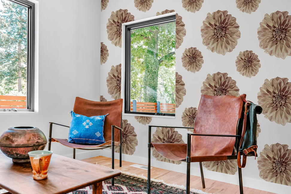 Floral wallpaper panel on wall with floating beige flower motifs