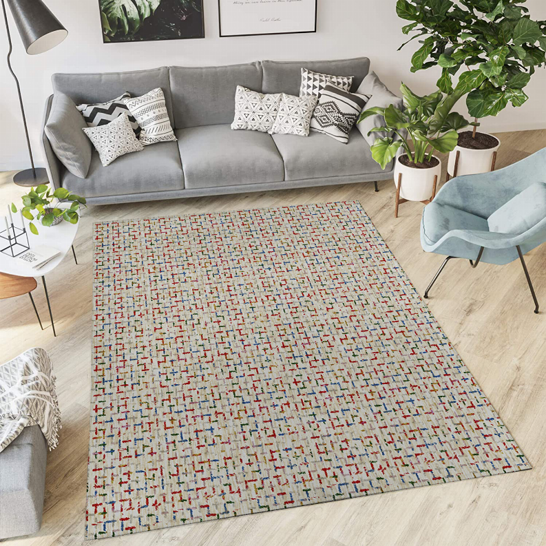 Low-pile multicolor rectangular carpet with stitched border and cross pattern