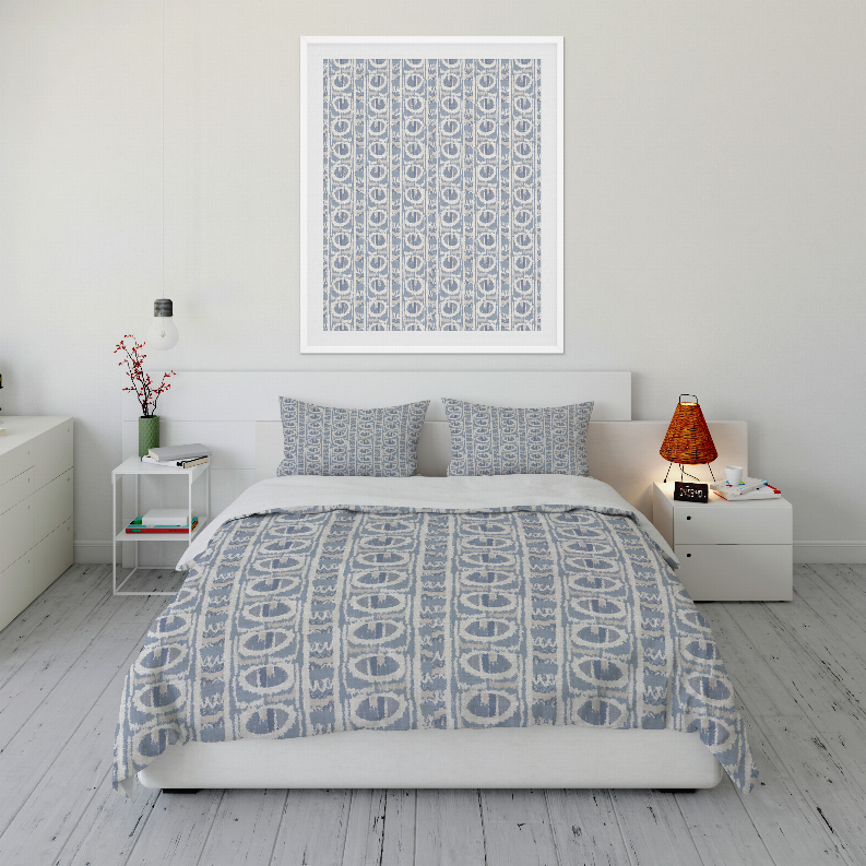Blue patterned duvet cover set with matching pillow shams, geometric motif