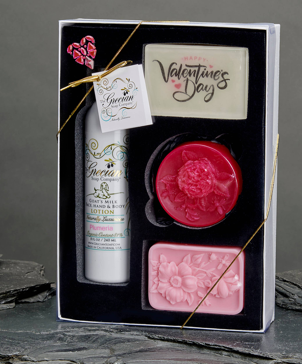 Valentine's Day gift set box with red heart soap, pink soap bar, lotion tube, card