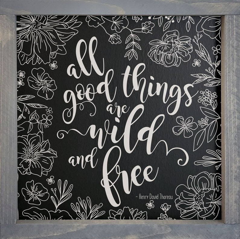 Framed wood sign with floral line art and quote: all good things are wild and free