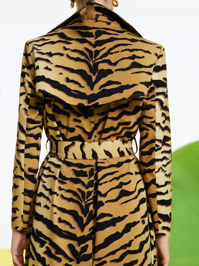 Back view of tiger-print trench coat with belted waist and long sleeves