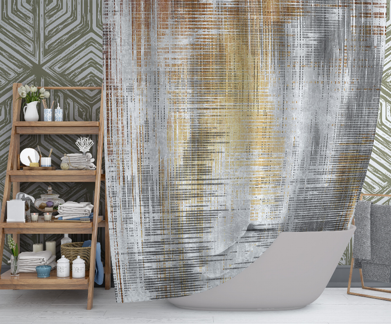 Shower curtain with abstract blocky lines in white, gray, and muted orange-yellow, draped