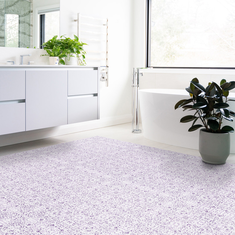 Lavender floral non-slip indoor/outdoor rug with scattered purple blossoms