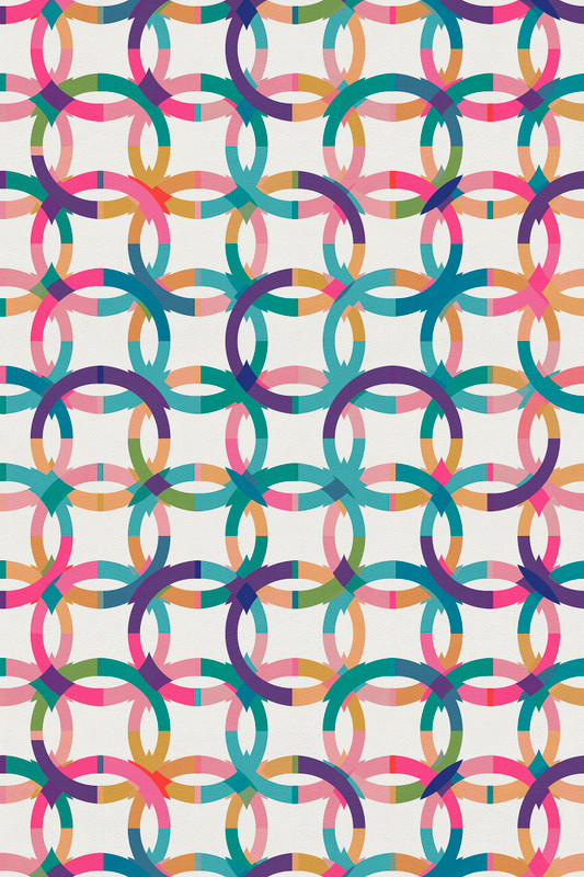 Colorful interlocking ring geometric rug pattern on off-white background
