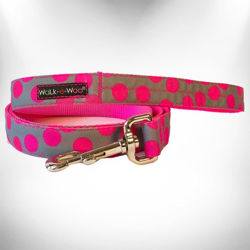 Pink polka dot dog collar with gold buckle and Walk-e-Woo label