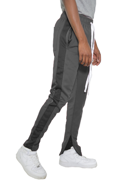 Slim fit track pants in dark gray, elastic waistband, side zip pocket, ankle cuff