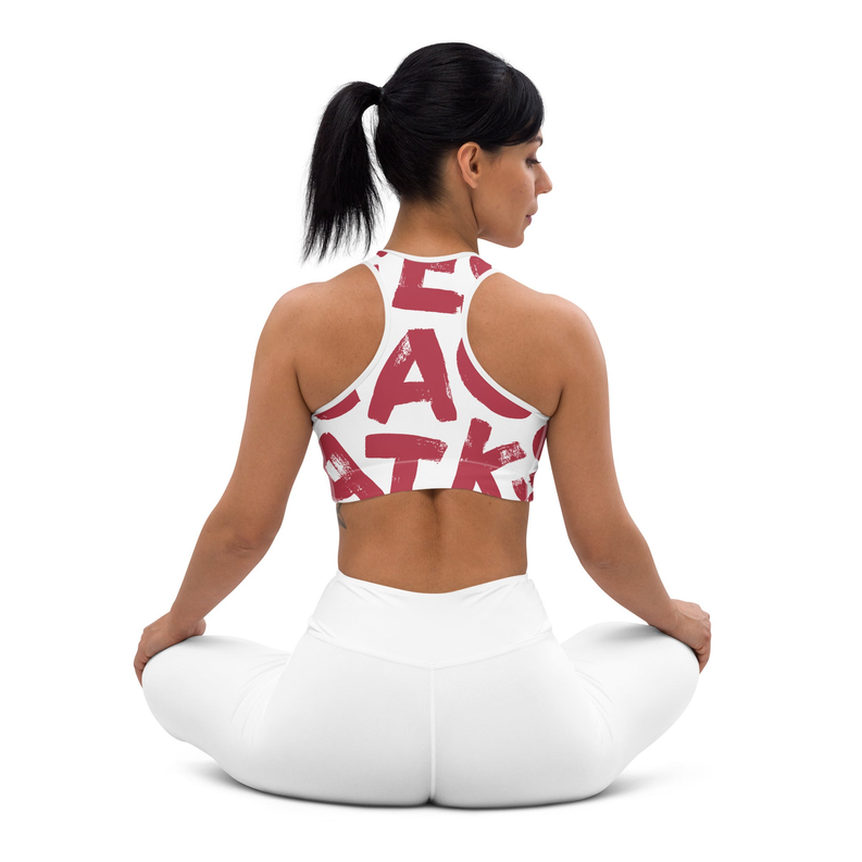 Red and white patterned racerback sports bra shown from the back