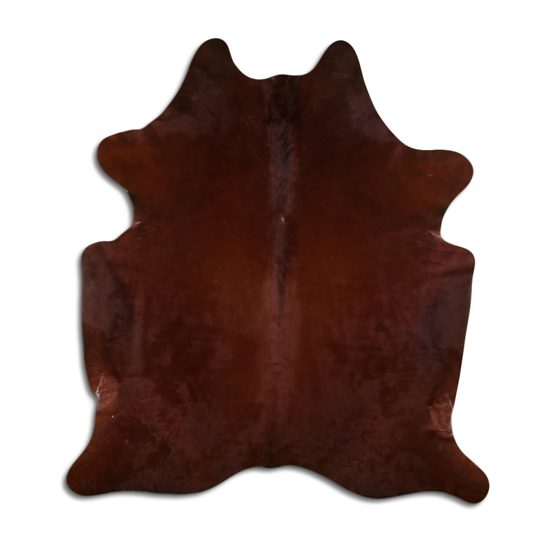 Brown cowhide rug with natural hair, irregular hide shape