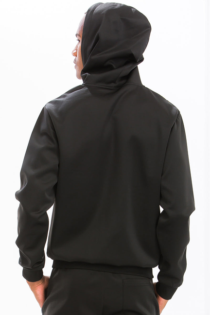 Black zip hoodie from the back with hood; no-print back view of track set
