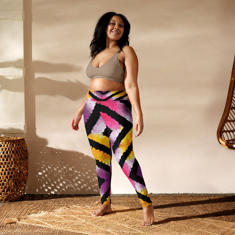 Tie-dye yoga leggings with fitted ankle-length legs and bold pink, purple, yellow print