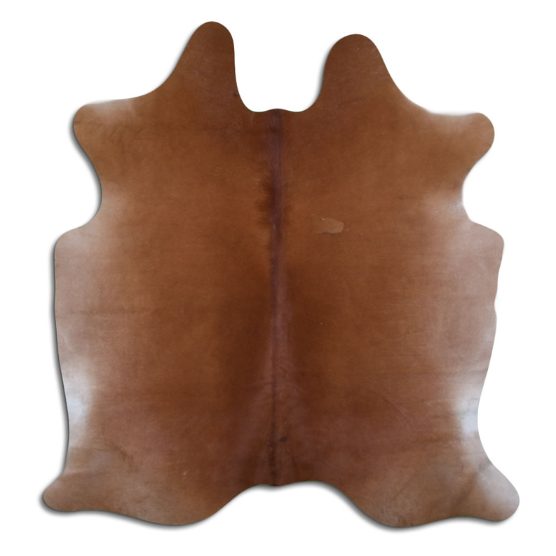 Brown hair-on cowhide rug with irregular hide shape