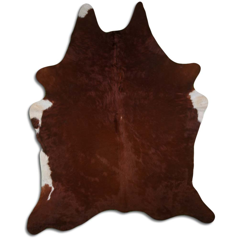 Brown hair-on cowhide rug with natural fur texture and irregular hide edges