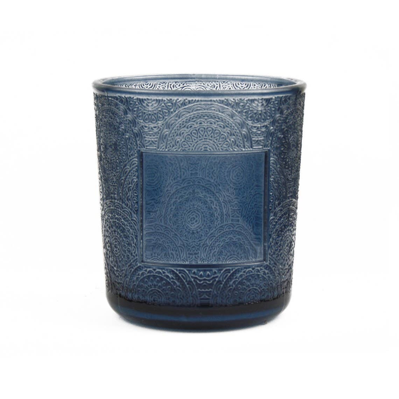 Blue floral-pattern candle jar with square cutout window
