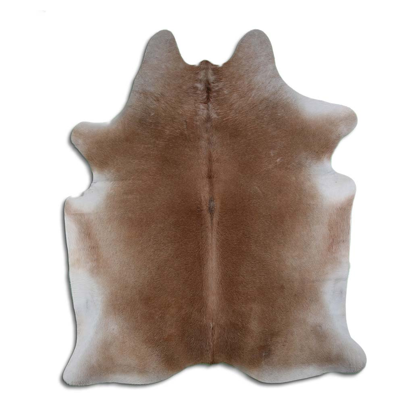 Brown cowhide rug with natural hair, irregular shape and natural texture