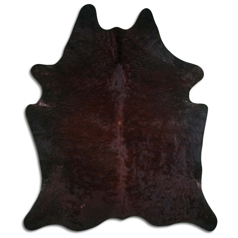 Brown cowhide rug with irregular shape and short shaggy hair