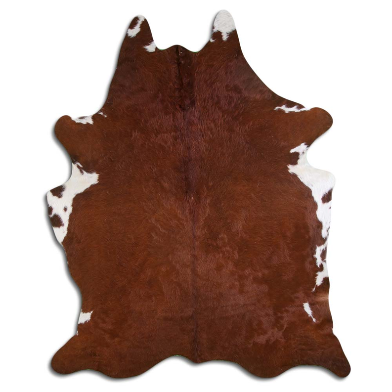 Brown cowhide rug with natural hair and irregular white spots