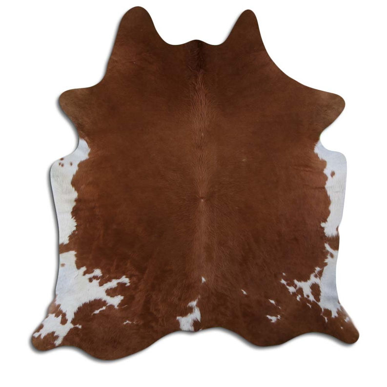 Brown cowhide rug with natural hair and irregular white patches