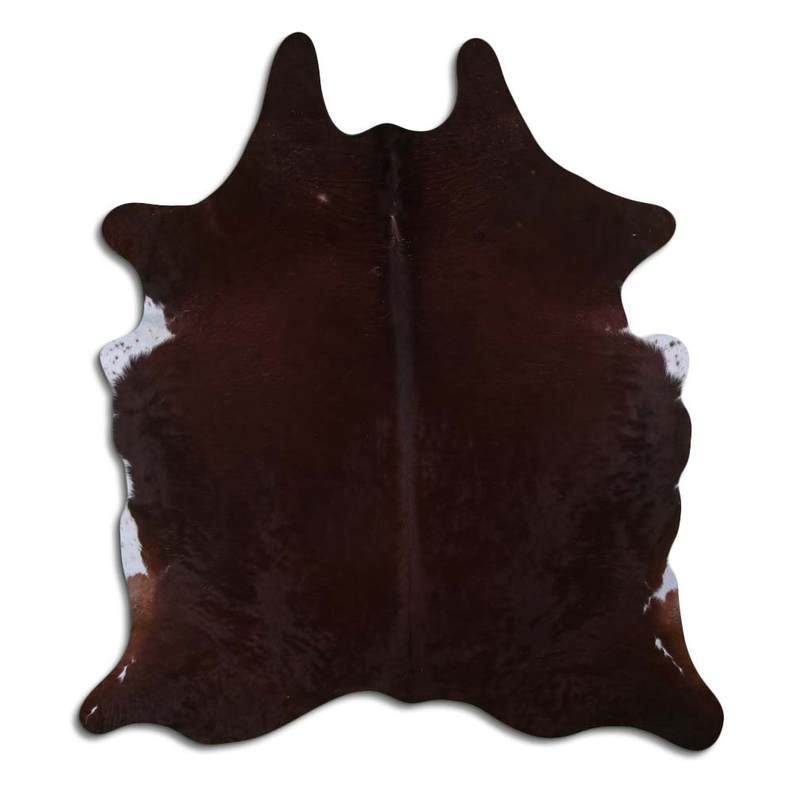 Brown cowhide rug with natural hair, irregular hide shape.